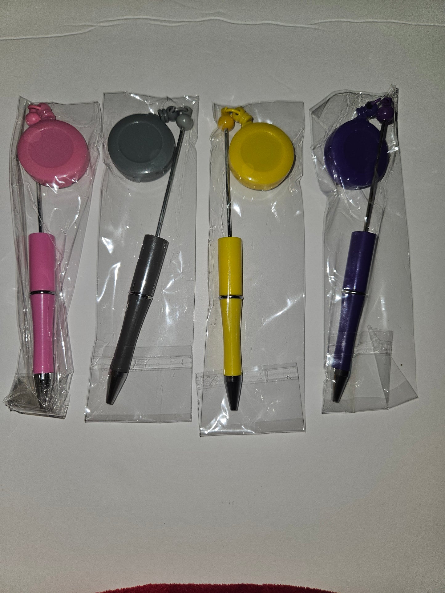 Beadable reel pens